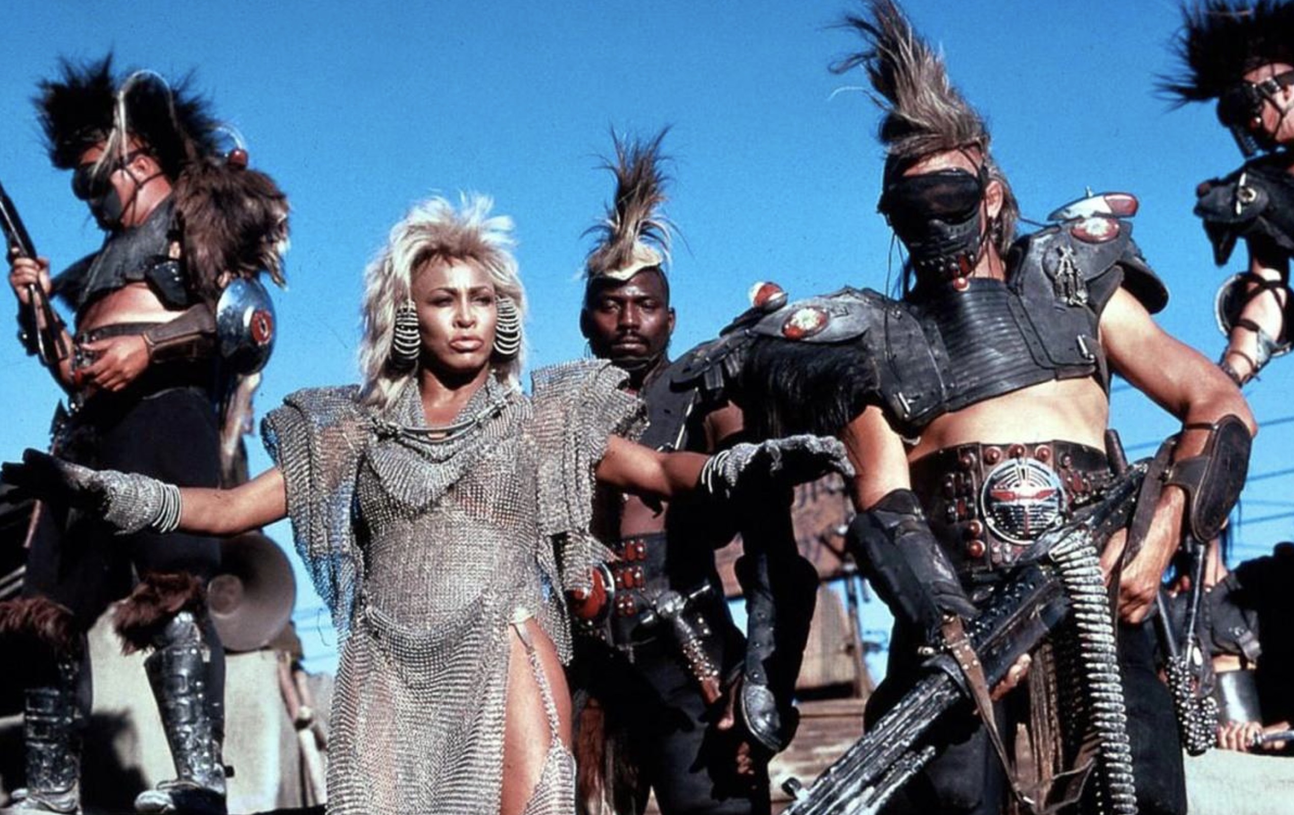 Tina Turner as Aunty Entity and her warriors on the set. Mad Max: Beyond Thunderdome, 1985 